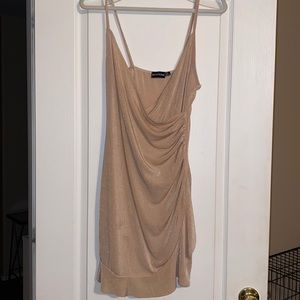 Slinky champagne frill hem dress